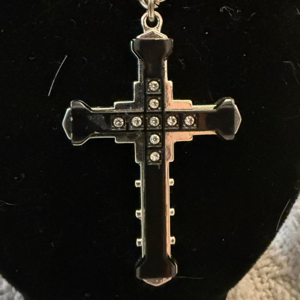Black cross necklace with silver tone crystal accents